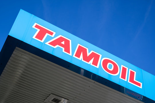 DEN BURG, THE NETHERLANDS - OCTOBER 31, 2018: Tamoil sign at gas station. Tamoil is the trading name of the Oilinvest Group, a fuel energy provider within the European downstream oil and gas sector.