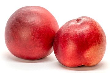 Juicy peach-nectarine isolated on white background
