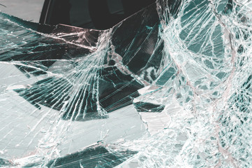 Broken car windshield. Old and dirty windshield of the car. Accident of car. Cracked glass effect for design element. Selective focus