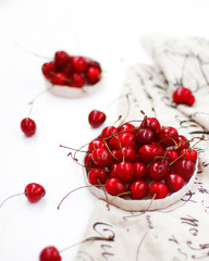 Obraz na płótnie Canvas Cherries. Cherry. Cherries in white handmade ceramic rustic bowl. Red cherry.