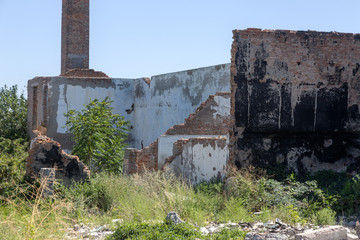 Ruined house. Remains of old houses. Apocalypse. Abandoned city. City of ghosts. Ruins of old...