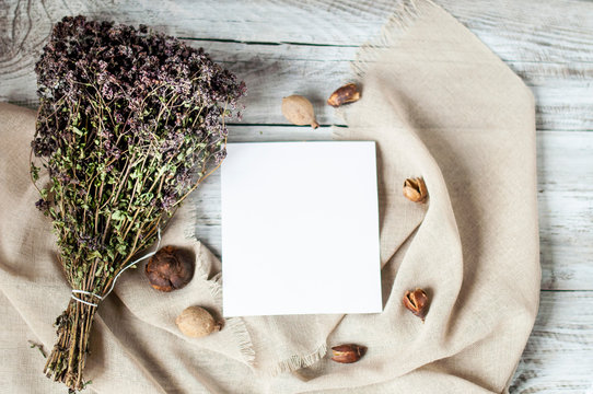 dry herbs, origano on a wooden background, spices