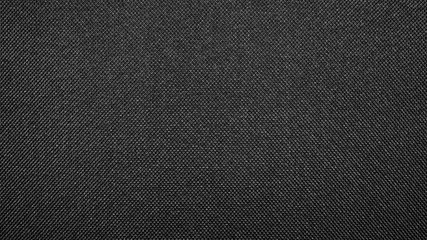 Texture of black dense fabric.Dark fabric background.