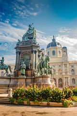 Fototapeta na wymiar Memorial monument of empress Maria Theresa, flowers and direct light in Vienna, Austria, closeup, details