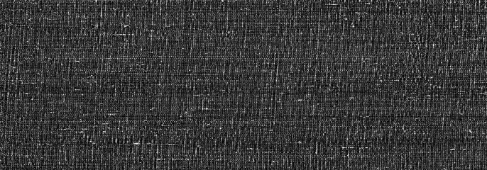 The Grunge texture of the wrong side of knitted fabric. Monochrome background of wavy knit fibers with spots, halftone and noise. For posters, banners, retro and urban design