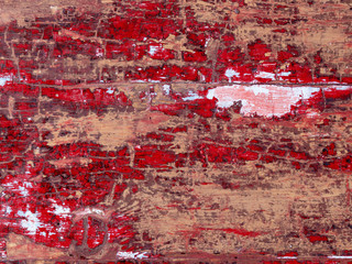 Old wooden shabby red background texture in part of rustic fence walls of house