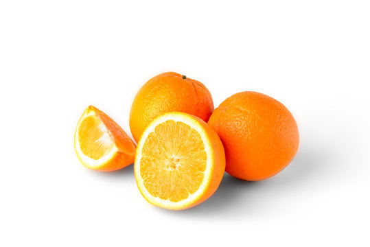 Sliced oranges fruit segments isolated on white background