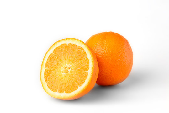 Sliced oranges fruit segments isolated on white background