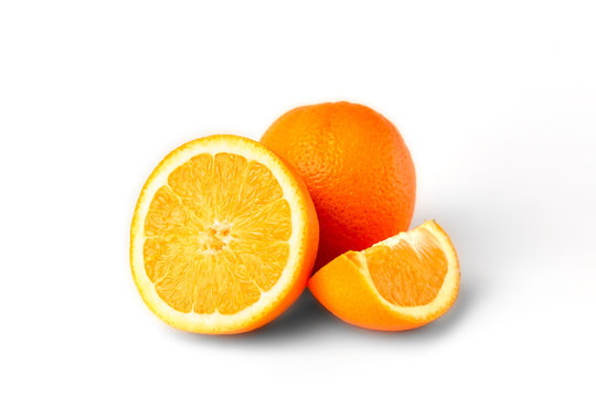 Sliced oranges fruit segments isolated on white background
