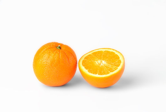 Sliced oranges fruit segments isolated on white background