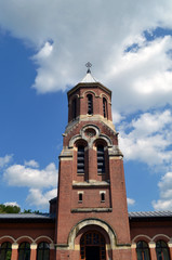 Fototapeta na wymiar Tower of the church of an old Orthodox monastery from Romania, Eastern Europe
