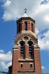Fototapeta na wymiar Tower of the church of an old Orthodox monastery from Romania, Eastern Europe