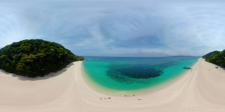 Tropical white sand beach, near the blue lagoon and corall reef 360VR from above, Boracay, Philippines. Sandy beach with tourists. Summer and travel vacation concept.