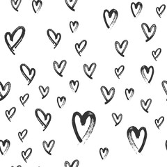 Heart doodles seamless love pattern. Hand drawn brushed hearts. Background texture for valentine's day.