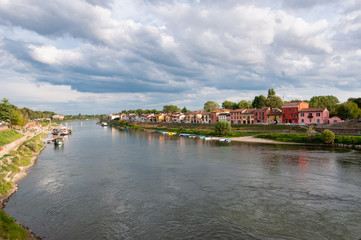 Fototapeta na wymiar Houses along the banks of the Ticino taken from the Covered Bridge of Pavia