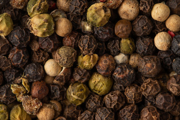 Peppercorn Pea Background. black pepper peas, closeup. macro, horizontal frame