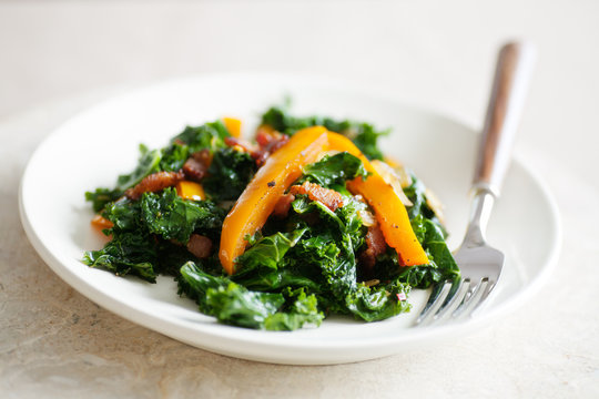 Kale Bacon Sweet Peppers on a plate with fork