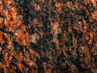 Polished granite texture close up in the detail