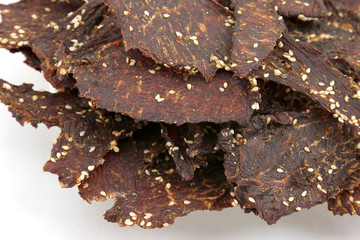 dried beef slices in spices with sesame seeds