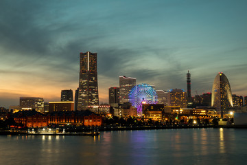 Fototapeta na wymiar Yokohama City Port in the Sunset during winter season, Cityscape lighting view from Osan Bashi.