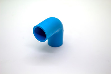 Plastic joints for water pipes on a white background, spare equipment