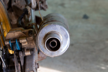 Picture of motorcycle exhaust pipe with oil stain