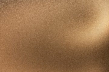Brushed brown metallic wall with scratched surface, abstract texture background