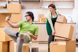 Mother and son moving to new flat