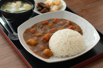 Curry rice , Japanese food on wooden table