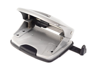  hole punch closeup lies on a white background