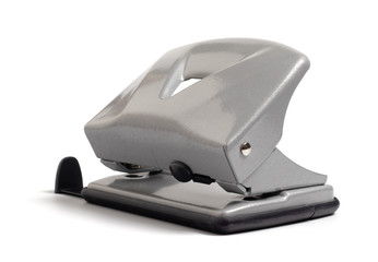 gray paper hole punch stoirt on a white background