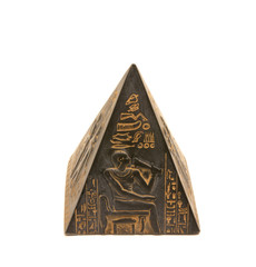 pyramid figurine stands on a white background