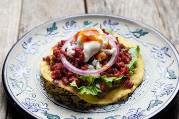 Mexican tortilla toast with chorizo also called "tostadas"