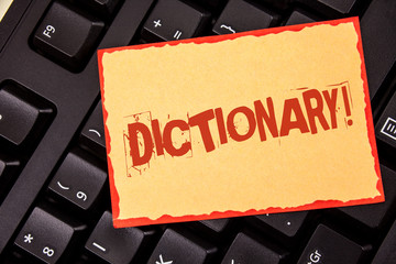 Word writing text Dictionary Motivational Call. Business concept for Learning another vocabs and synonyms from book written Sticky Note Paper placed Black Keyboard. Top view.