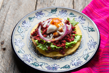 Mexican tortilla toast with chorizo also called 