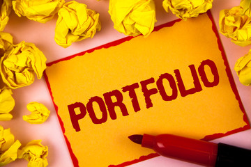 Writing note showing Portfolio. Business photo showcasing Examples of work used to apply for a job Combination of shares written Sticky Note paper within Paper Balls plain background.