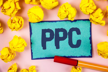 Writing note showing Ppc. Business photo showcasing Pay Per Click Advertising Strategies Direct Traffic to Websites written Sticky note paper within paper balls plain background Pen