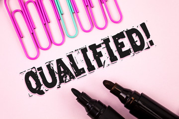 Handwriting text Qualified Motivational Call. Concept meaning Certified to perform a job Competent Experienced written Plain Pink background Paper Clips and Markers next to it.