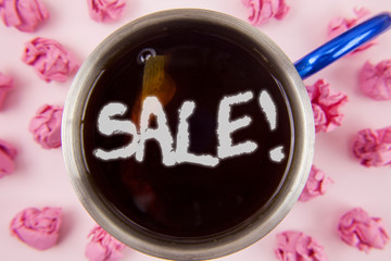 Conceptual hand writing showing Sale Motivational Call. Business photo showcasing Selling goods at reduced prices Make a Sell written Tea in Cup within Paper Balls plain background.
