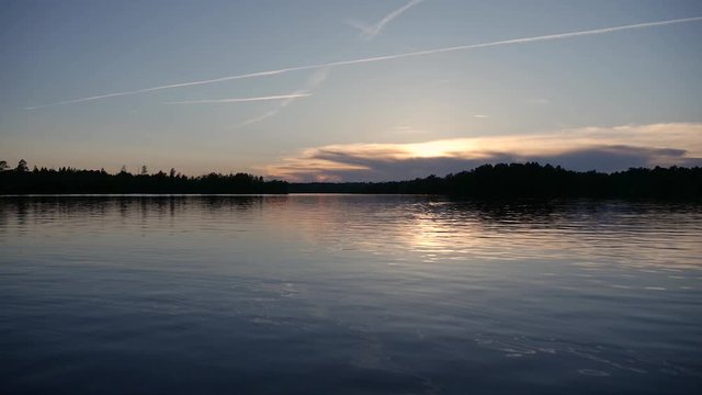 Calm lake at sunset in sweden