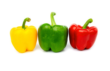 Yellow Green and Red peppers Three types isolated on white background