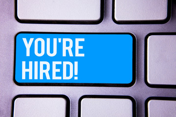 Wordss writing textss You Are Hired Motivational Call. Business concept for New employee recruited...