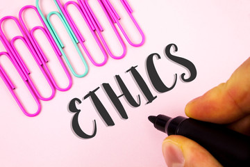 Word writing text Ethics. Business concept for Maintaining equality balance among others having...