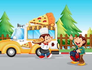 Monkeys serving pizza in park
