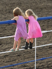 mother and daughter walking on beach