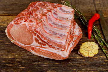 Pork tenderloin on ribs with garlic.