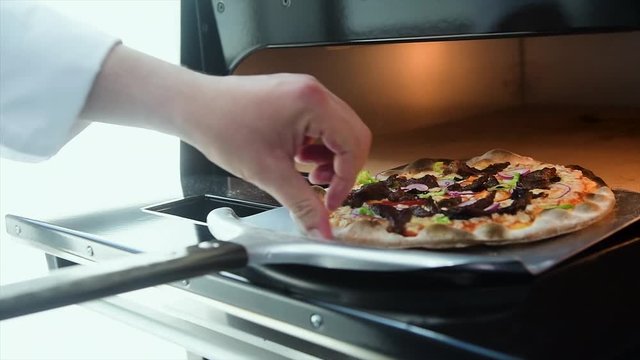 Pizza Making Process in slow motion and normal shot