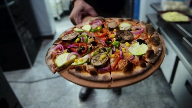 Pizza Making Process in slow motion and normal shot