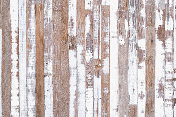 Grunge background. Peeling white paint on an old wooden background. Old Rustic Wood background. Vintage retro background.