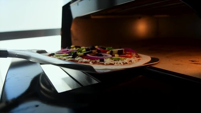 Pizza Making Process in slow motion and normal shot